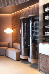 Spa interior featuring glass cylinders and minimalist design