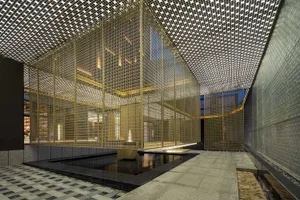 A modern shop interior featuring a metal striped ceiling and concrete floor.