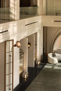 Modern interior space featuring luxury materials like marble and glass.