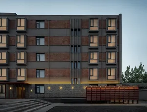 Modern building exterior featuring brick material.
