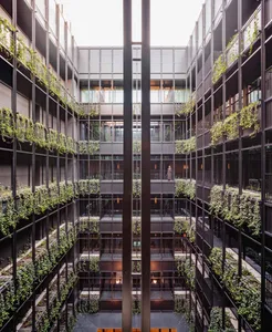 Modern building with glass windows and steel structure.