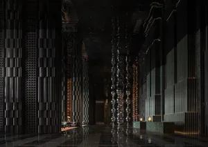 Modern lobby interior with metallic decor and black stone flooring