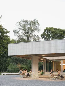 Outdoor cafe with concrete shed and modern design