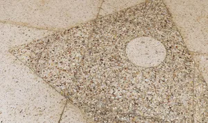 Modern floor tile pattern featuring a terrazzo design