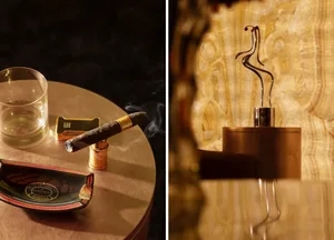 A modern, abstract sculpture made of bronze.