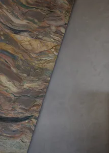 Comparison of marble and concrete floor materials in a modern interior design setting.