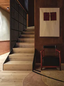Wooden residential interior with minimalist design elements.