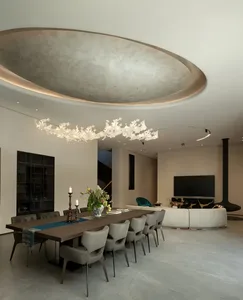 Modern dining room featuring minimalist materials and sleek design elements.