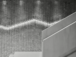 Modern industrial interior with concrete walls and geometric patterns