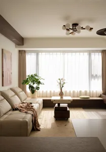 A modern, minimalist living room with clean lines, light wood finishes, and neutral color palette featuring a comfortable sof