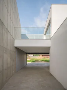 A modern staircase made of concrete with clean lines and a minimalist design.