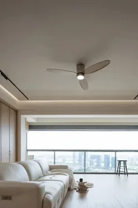 A modern living room featuring neutral-colored furniture and a sleek design.