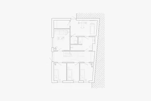 A minimalist residential interior layout with open spaces and white walls.