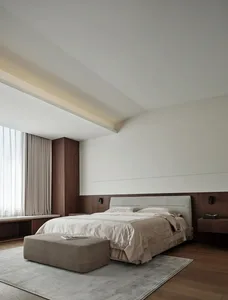 Modern minimalist bedroom featuring wood floor, upholstered bed, glass window, and floating nightstands.