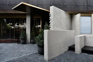 Concrete and glass entrance area of a modern commercial building