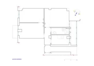 Technical drawing of a building's layout, including dimensions and room arrangements.