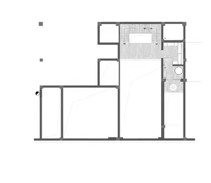 Blueprint of a modern apartment layout showing various rooms and spaces.