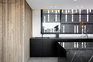 Contemporary room featuring steel and marble materials.