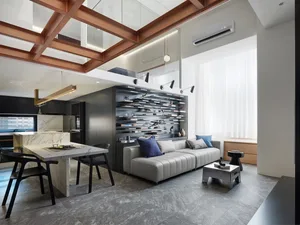 Contemporary living room featuring metallic, glass, and marble materials