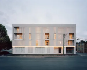 Modern building facade featuring metal perforated panels