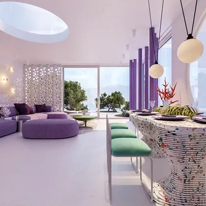 Modern living room with concrete floor and furniture, large windows, and a view of the sea.