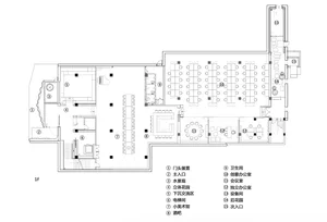 2D architectural drawing of a restaurant interior showing various functional spaces and furniture arrangement.