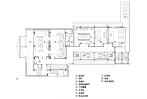 2D architectural floor plan of a commercial space showing various functional zones like meeting rooms, offices, and restrooms