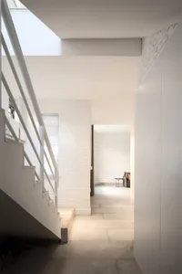 Photograph of a modern interior space with concrete elements.
