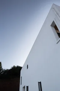Modern white concrete exterior wall of a building.
