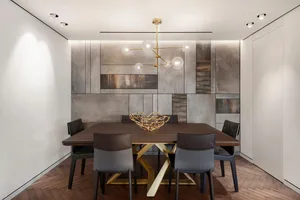 A modern dining room with a metal, wood, and concrete design featuring a wooden table, metal chairs, and a concrete wall.