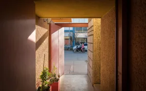 Concrete urban space view with a motorbike in the background.