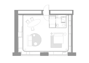 A minimalist apartment floor plan with a living room, bedroom, and bathroom.