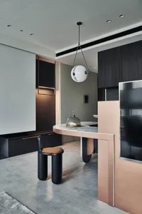 A modern residential kitchen featuring contemporary design elements and finishes.