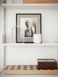 A minimalist interior design featuring a glass frame