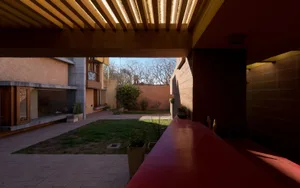 A modern interior space featuring concrete materials