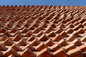 Clay roof tiles arranged in a geometric pattern