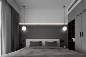 Modern bedroom with minimalist design featuring textured concrete walls.