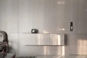 A modern minimalist living room with a light-colored wooden cabinet and a vase on top.