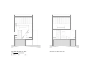 A detailed architectural drawing showing two vertical cross-sections of an interior space, including staircases, bathrooms, a