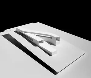 A minimalist architectural model made of white paper on a black background.