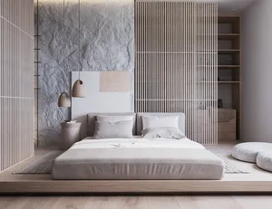 A minimalist bedroom featuring concrete and wood materials with a low-profile bed and hanging lamps.