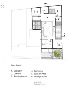 Floor plan of a modern residential building featuring concrete and glass materials.