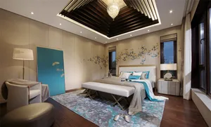 A modern residential bedroom featuring a cozy bed with turquoise accents, surrounded by soft lighting and elegant decor.