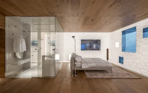 Modern bathroom and bedroom with wooden floors and walls.