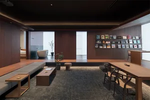 Modern living room with wood furniture and tiled floor.