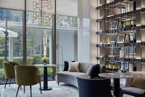 Modern lobby with luxurious marble flooring, comfortable seating, and contemporary design elements