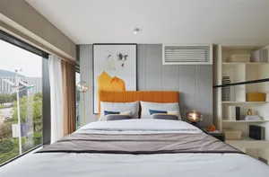 Contemporary bedroom with modern furniture, minimalist style, and sleek lines.