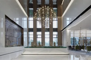 Modern lobby featuring glass walls and marble countertops.