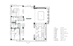 A detailed architectural plan depicting the layout of an office space, including functional zones and structural elements.