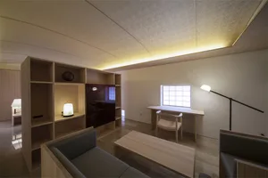 An industrial-style living room with metal furniture and minimalist design.